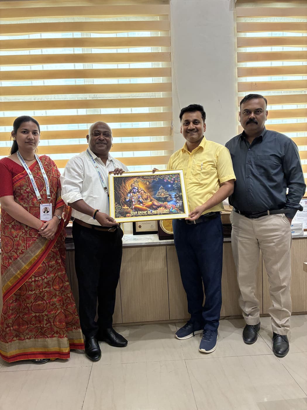 The Aao Seekhe team exchanging a memento with S R Group of Institutions leadership