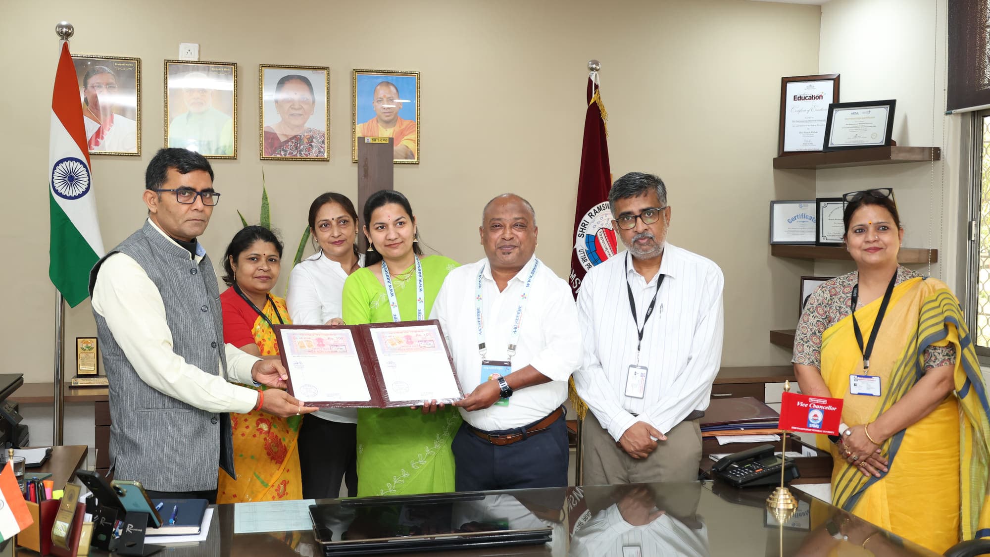 Aao Seekhe and Shri Ramswaroop Memorial University leadership holding the signed MOU